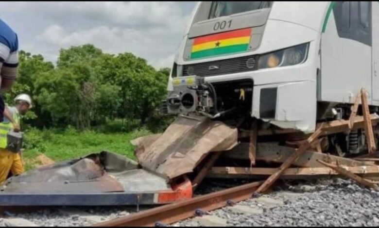 Driver arrested for abandoning truck on railway line, causing train accident.